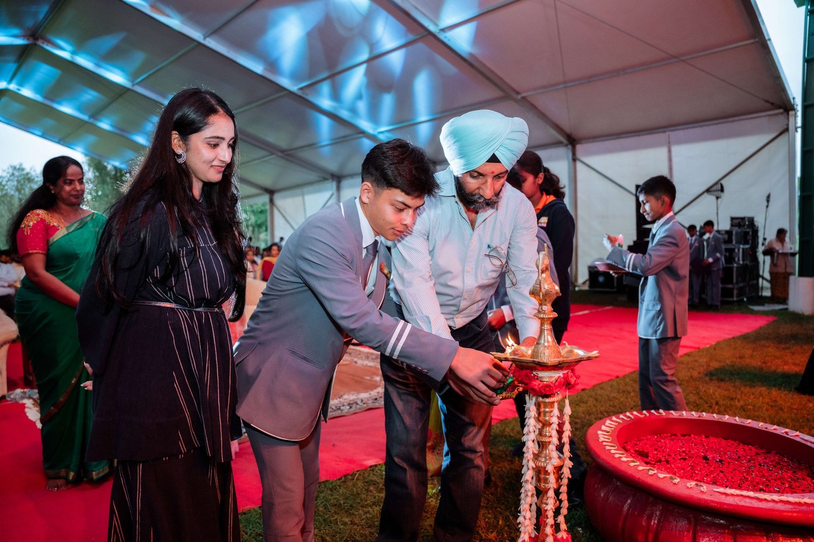 Ceremonial lamp lighting at Amber Valley Residential School event